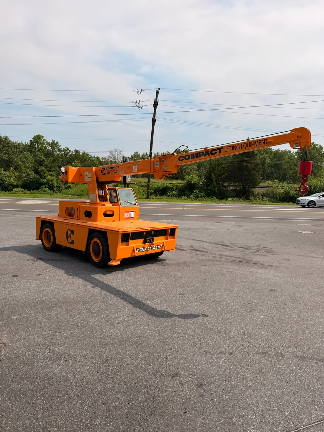 Broderson IC-40-2C carry-deck crane, boom extended, roadside